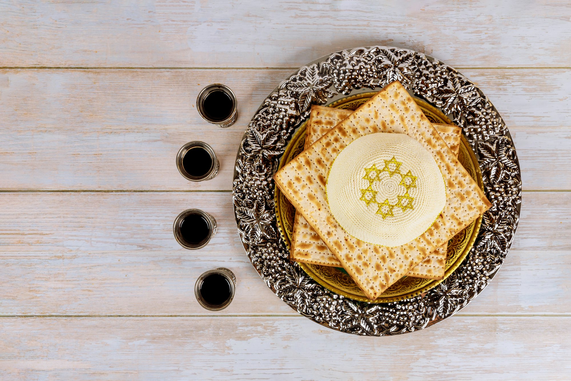 Passover pesah holiday celebration, matza unleavened bread and four cup kosher wine, jewish
